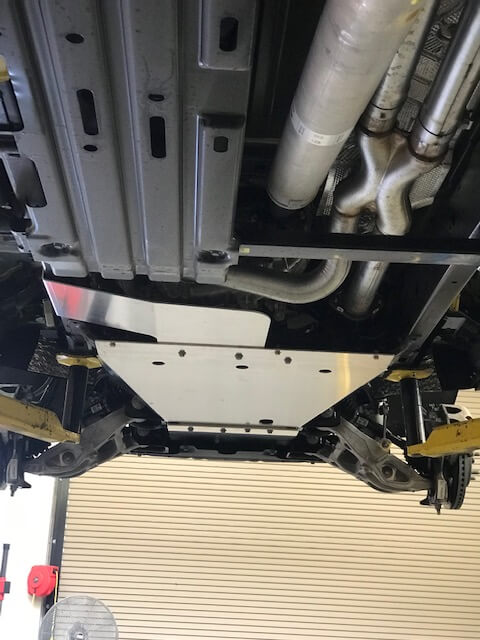 Durable skid plate kit for 2021-2024 Ram TRX, designed to protect the underbody during off-road adventures.