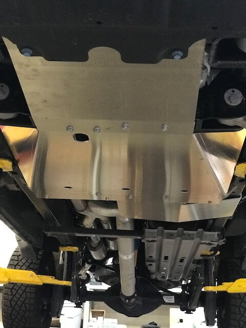 2021-2024 Ram TRX skid plate kit installed under the vehicle, providing protection for the underbody components.
