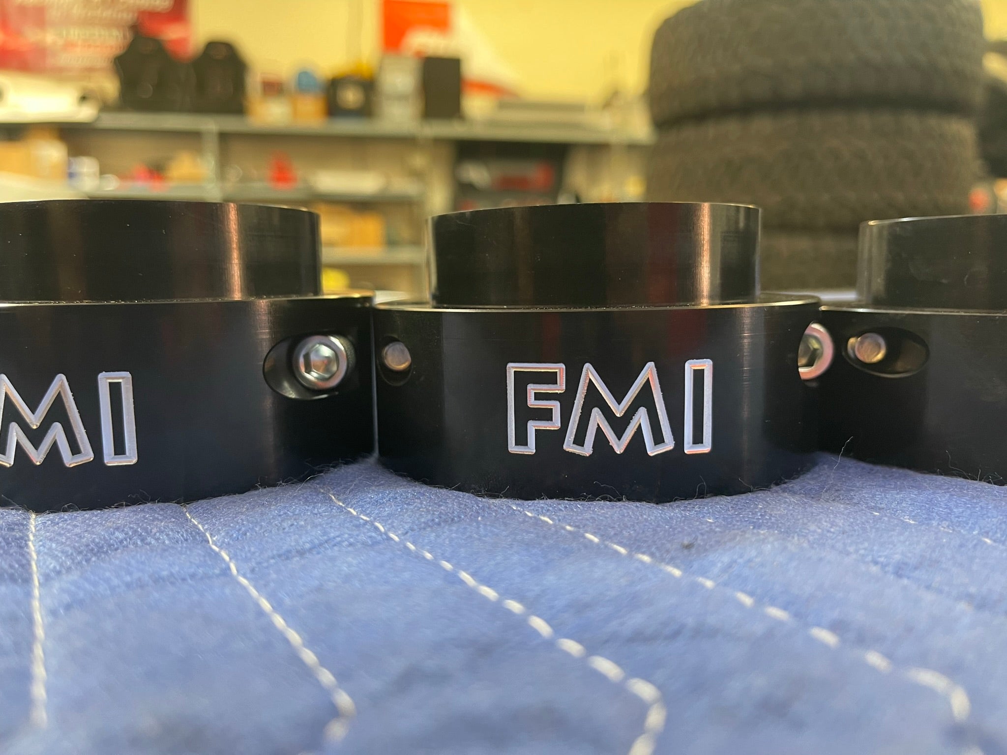 1.5-inch front leveling kit for 2021-2024 Ram TRX, featuring durable black components with FMI branding.
