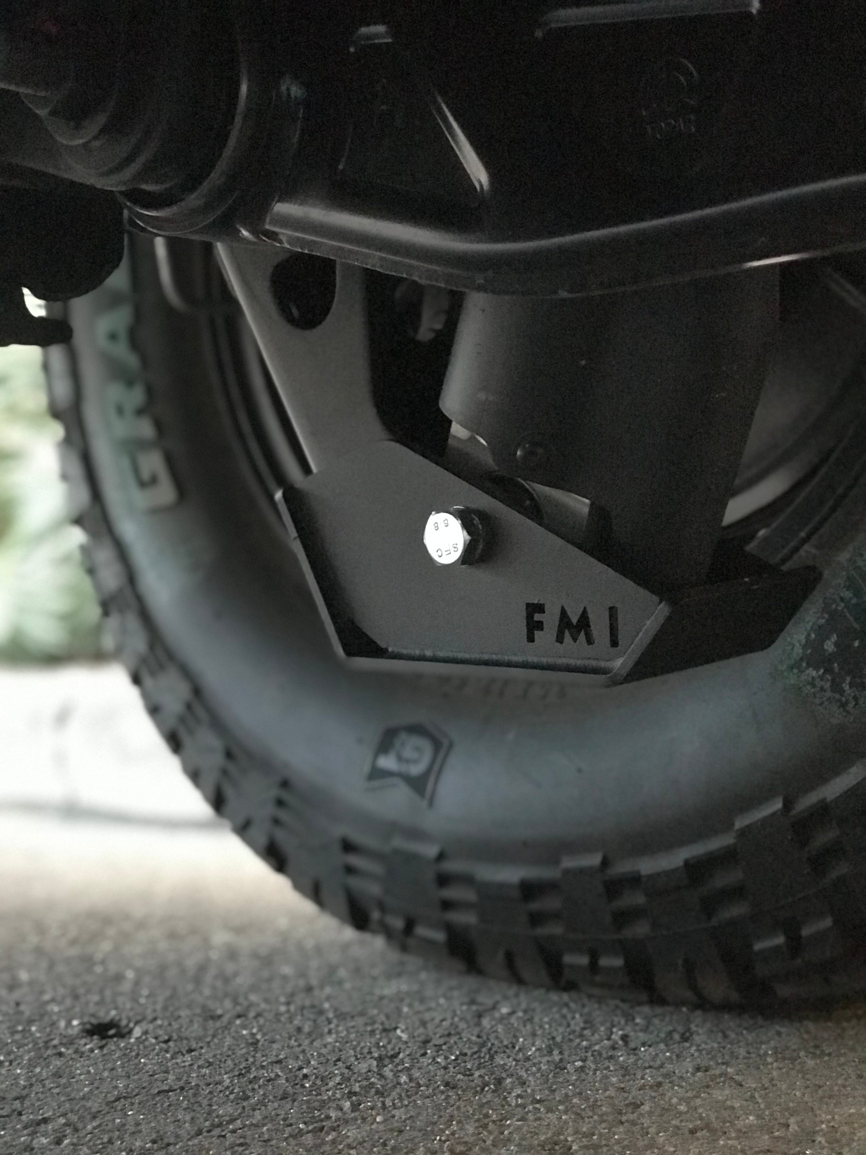 2025 Ram RHO Rear Shock Skid Kit mounted under a truck, showcasing durable protection for offroad shocks.