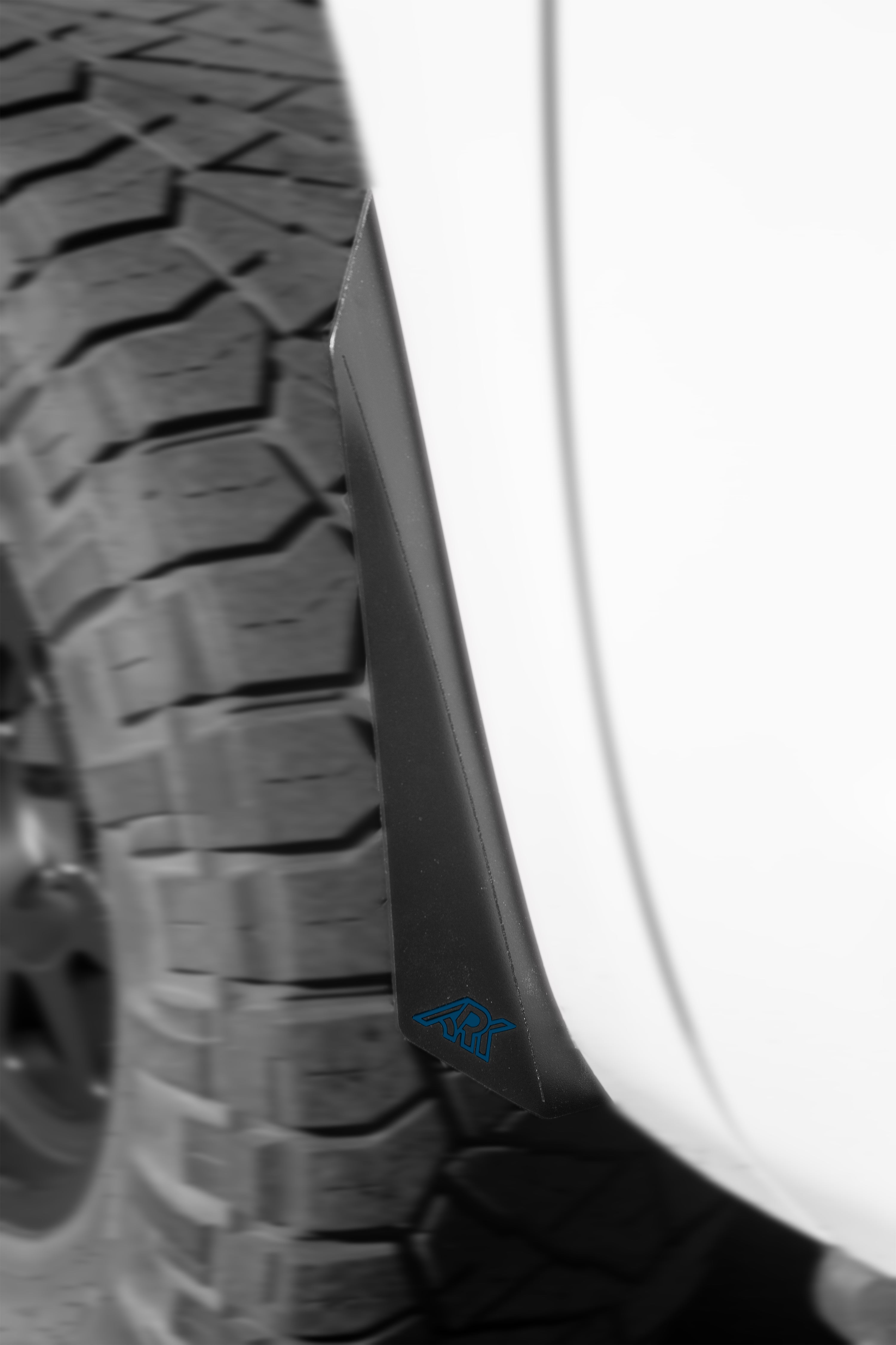 2007-2021 Toyota Tundra TriXpoly Micro Flares installed on a truck, enhancing tire coverage and style.