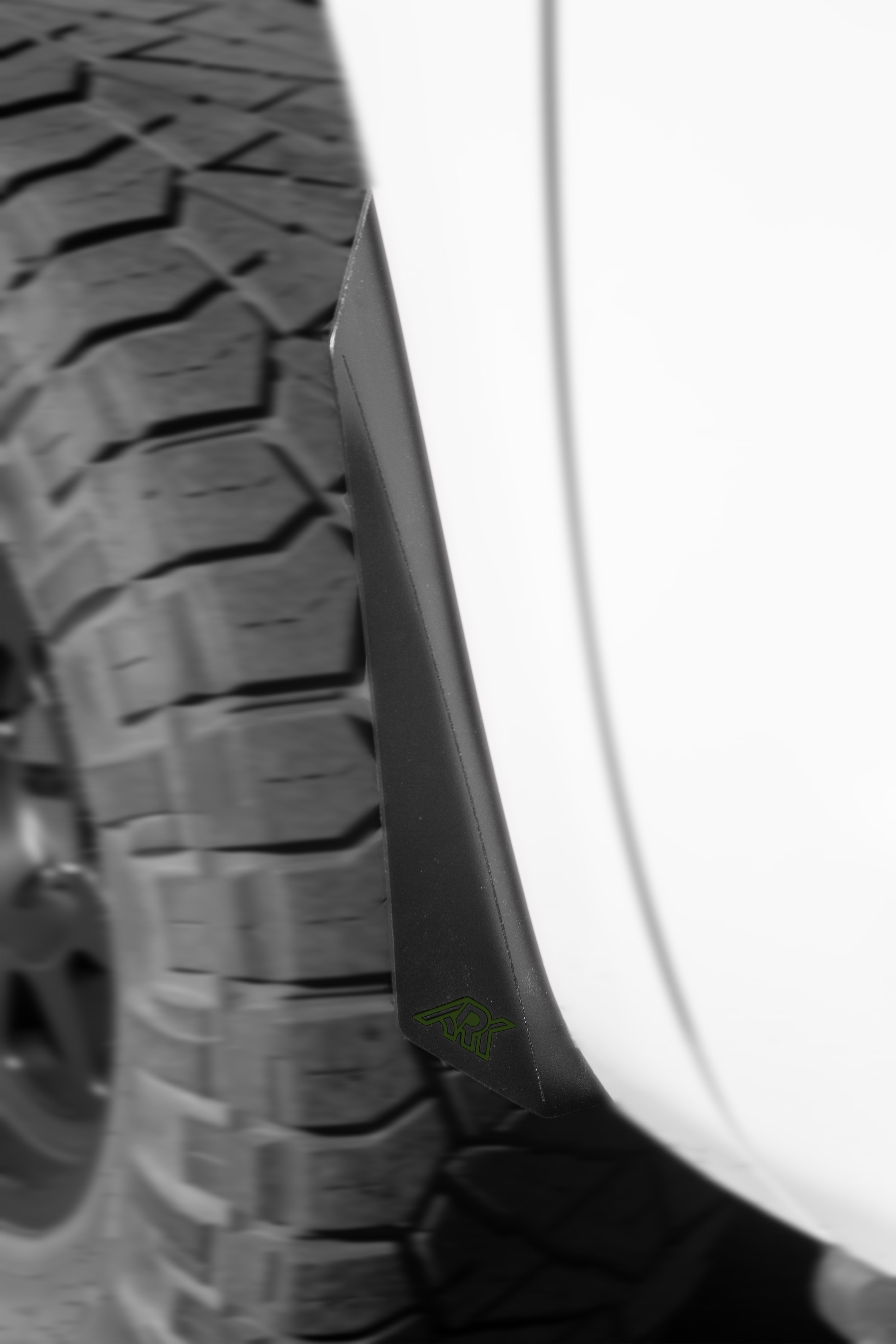 TriXpoly splash guards and mudflaps for 2007-2021 Toyota Tundra, designed to protect against mud and debris.