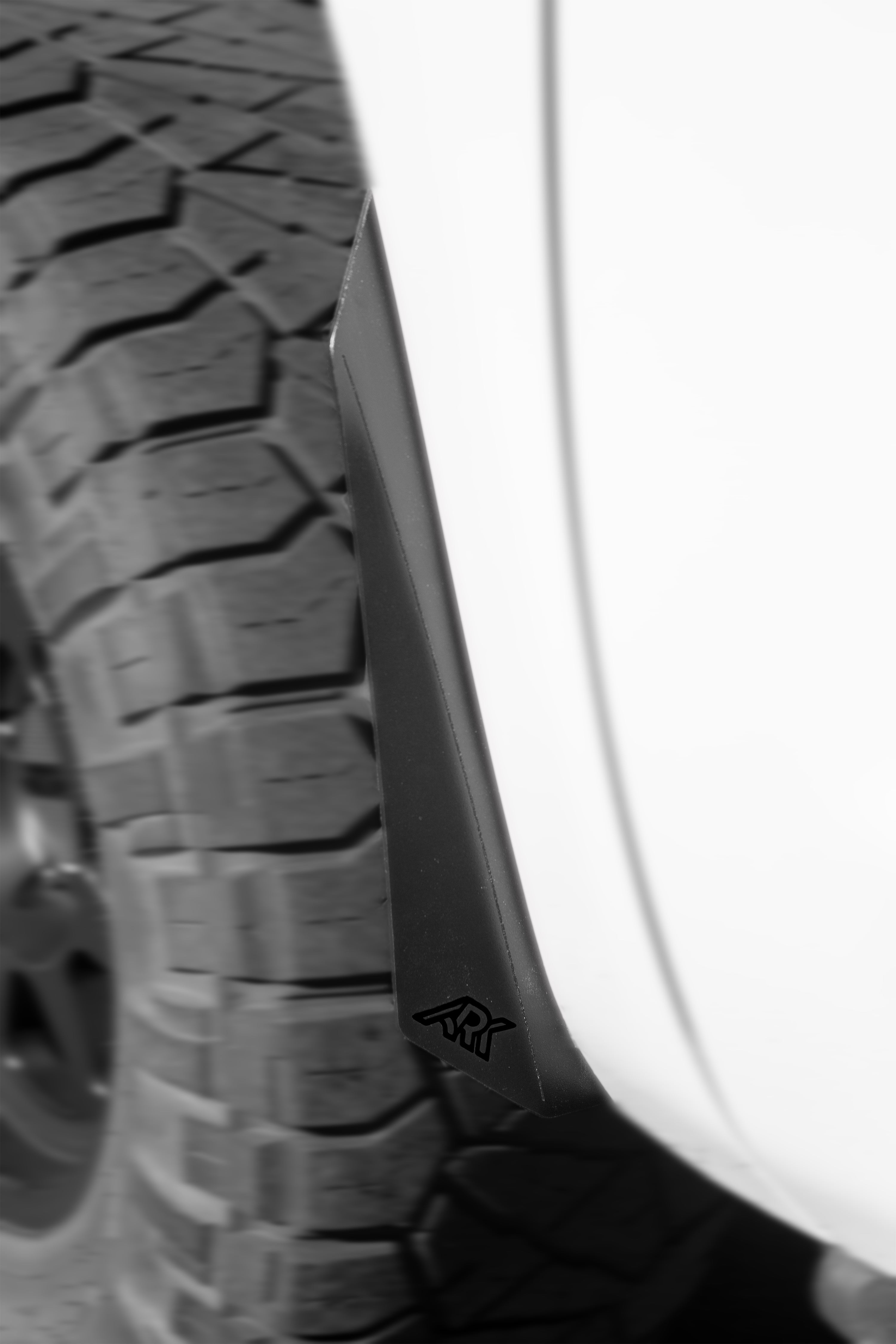 TriXpoly splash guards and mudflaps for 2007-2021 Toyota Tundra, designed to protect against mud and debris.