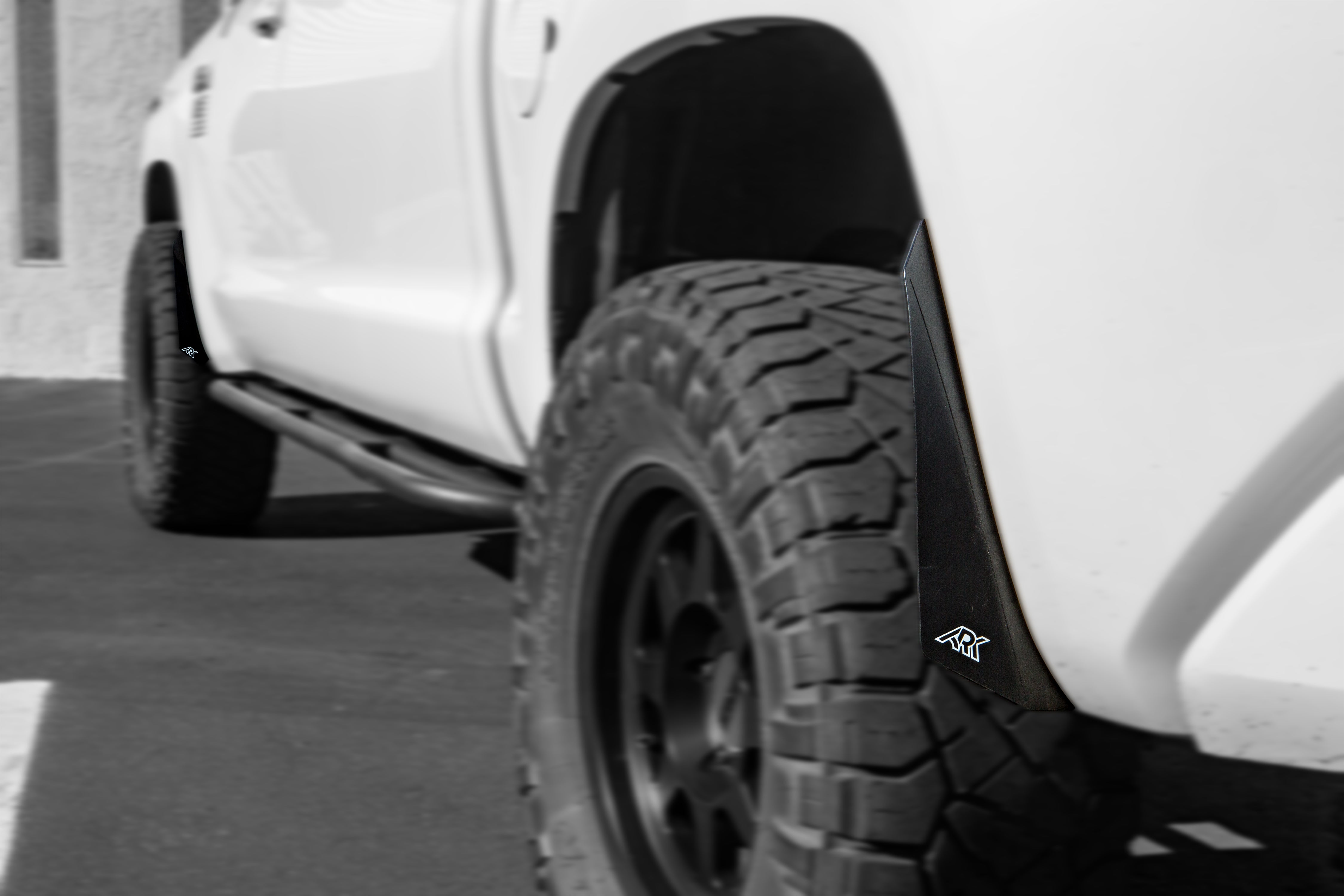 2007-2021 Toyota Tundra TriXpoly Micro Flares on a white truck, enhancing tire coverage and off-road style.