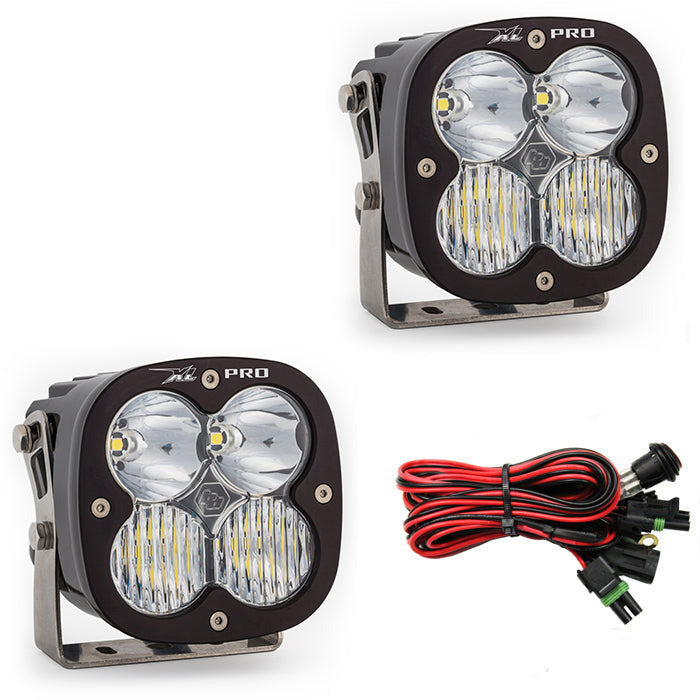 Baja Designs XL Pro LED light pair with four lenses each, mounted on brackets, and wiring harness included.