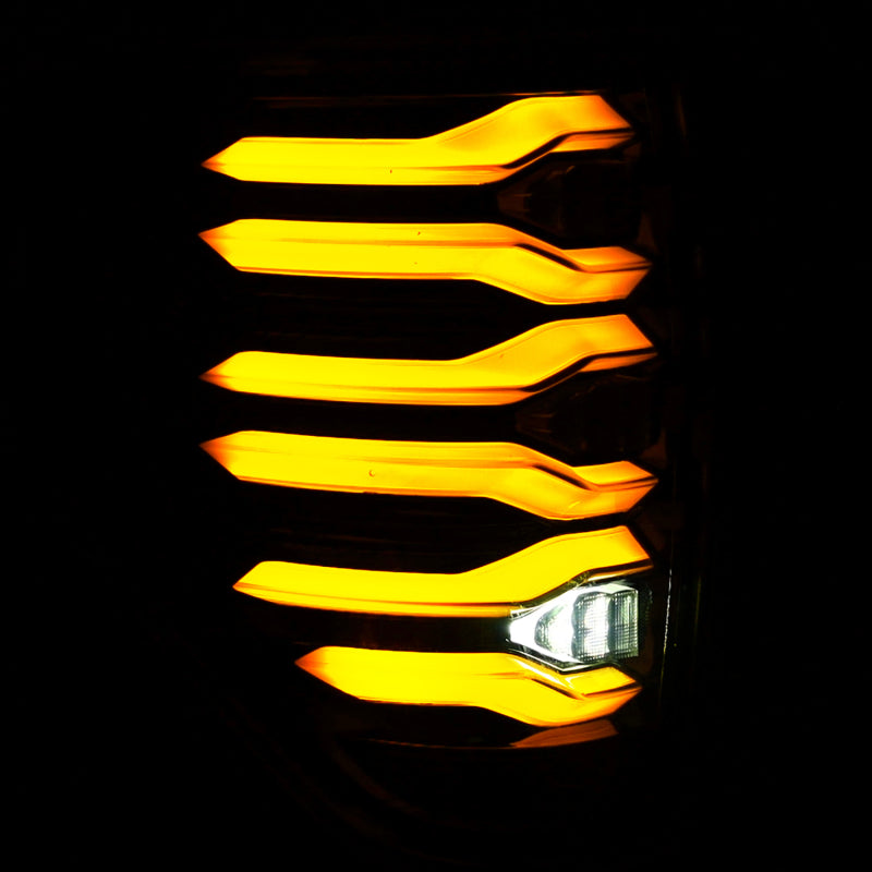 AlphaRex LUXX LED taillights for 09-14 Ford F150 in AlphaBlack housing, featuring a modern design with bright amber illumination.