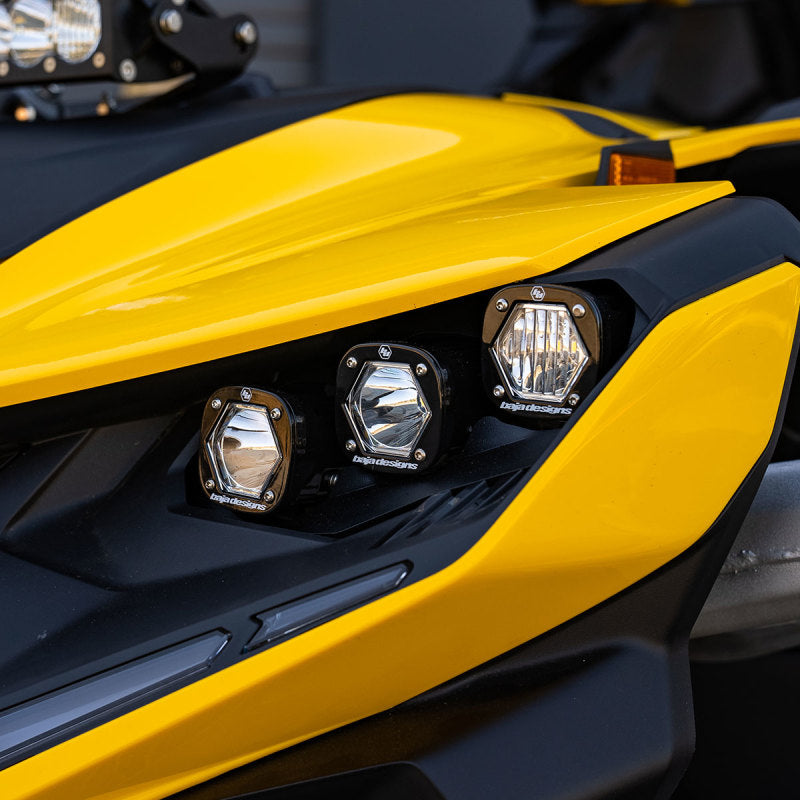 Baja Designs 2024+ Can-Am Maverick R S1 Headlight Kit featuring three high-performance lights on a yellow vehicle.
