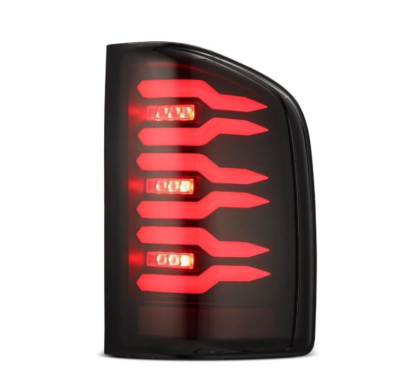 AlphaRex Luxx-Series LED tail light for 07-14 Chevrolet Silverado with black housing and smoked lens design.