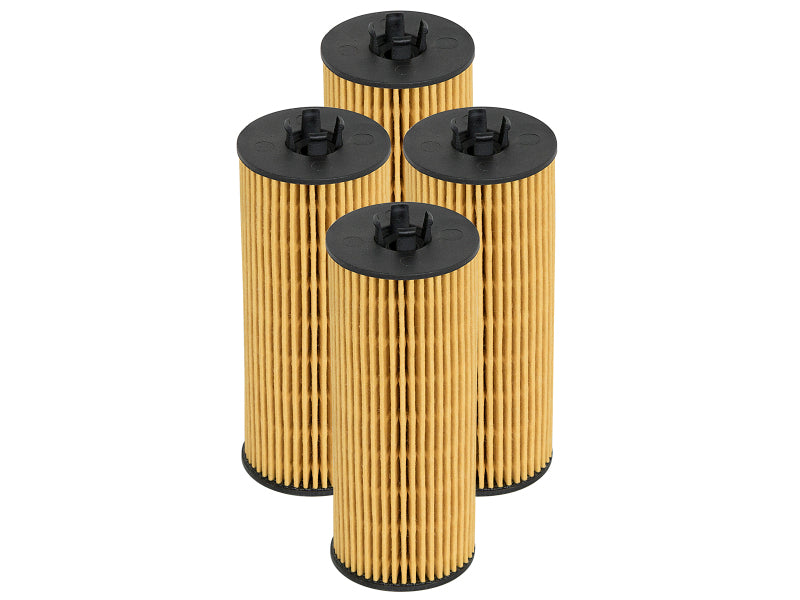 Four afe PROGUARD oil filters with a cylindrical design and pleated paper element, ideal for high-performance vehicles.