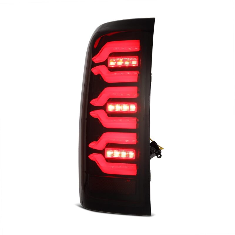 AlphaRex Luxx-Series LED tail light for 14-18 Chevy Silverado 1500 in black and red with sequential signal feature.