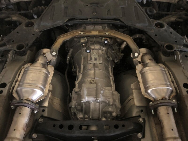 Direct fit aFe POWER catalytic converter for Nissan 350/370Z V6 engines, showcasing installation under the vehicle.