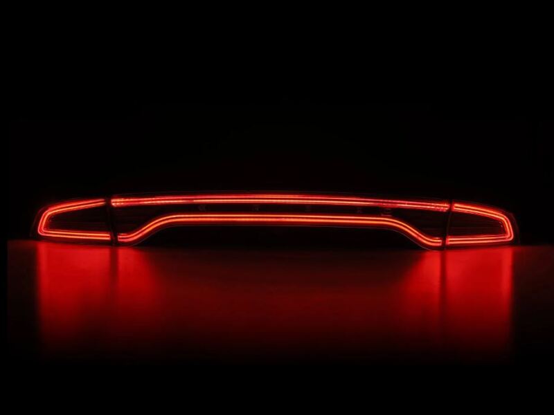 AlphaRex NOVA-Series prismatic LED tail lights for 2015-2023 Dodge Charger in chrome finish, showcasing a sleek red light design.