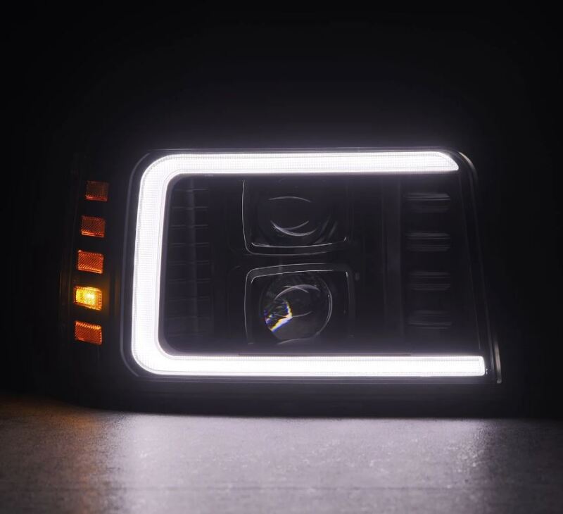 AlphaRex LUXX-Series projector headlights for 92-96 Ford F-Series/Bronco in black with sequential signal and daytime running lights.