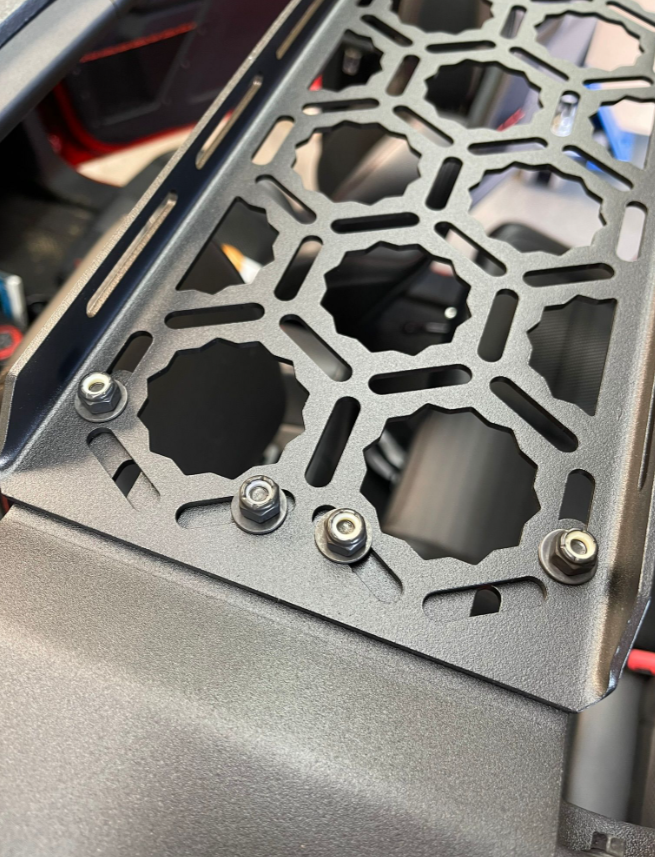 Inside roof panel mount for 2021 Bronco, designed for rear seat area, featuring durable metal construction and secure fasteners.
