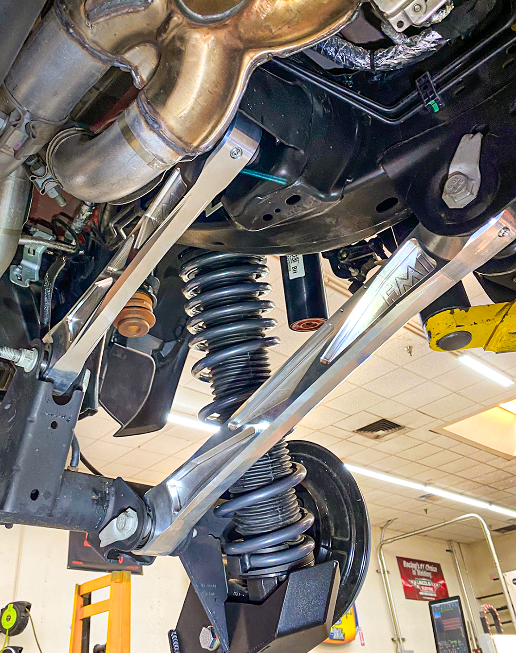 Billet aluminum rear suspension arms with ultra-flex joints installed on a 2022 Bronco Raptor, showcasing enhanced durability and flexibility.