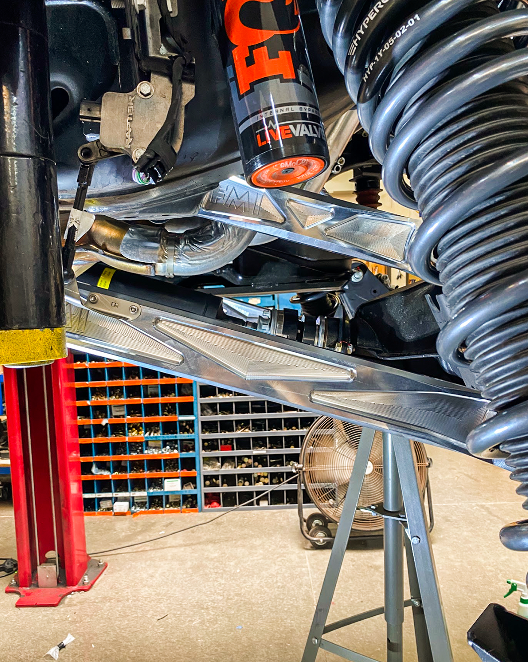 Billet aluminum rear suspension arms with ultra-flex joints installed on a 2022 Bronco Raptor, showcasing durability and performance.