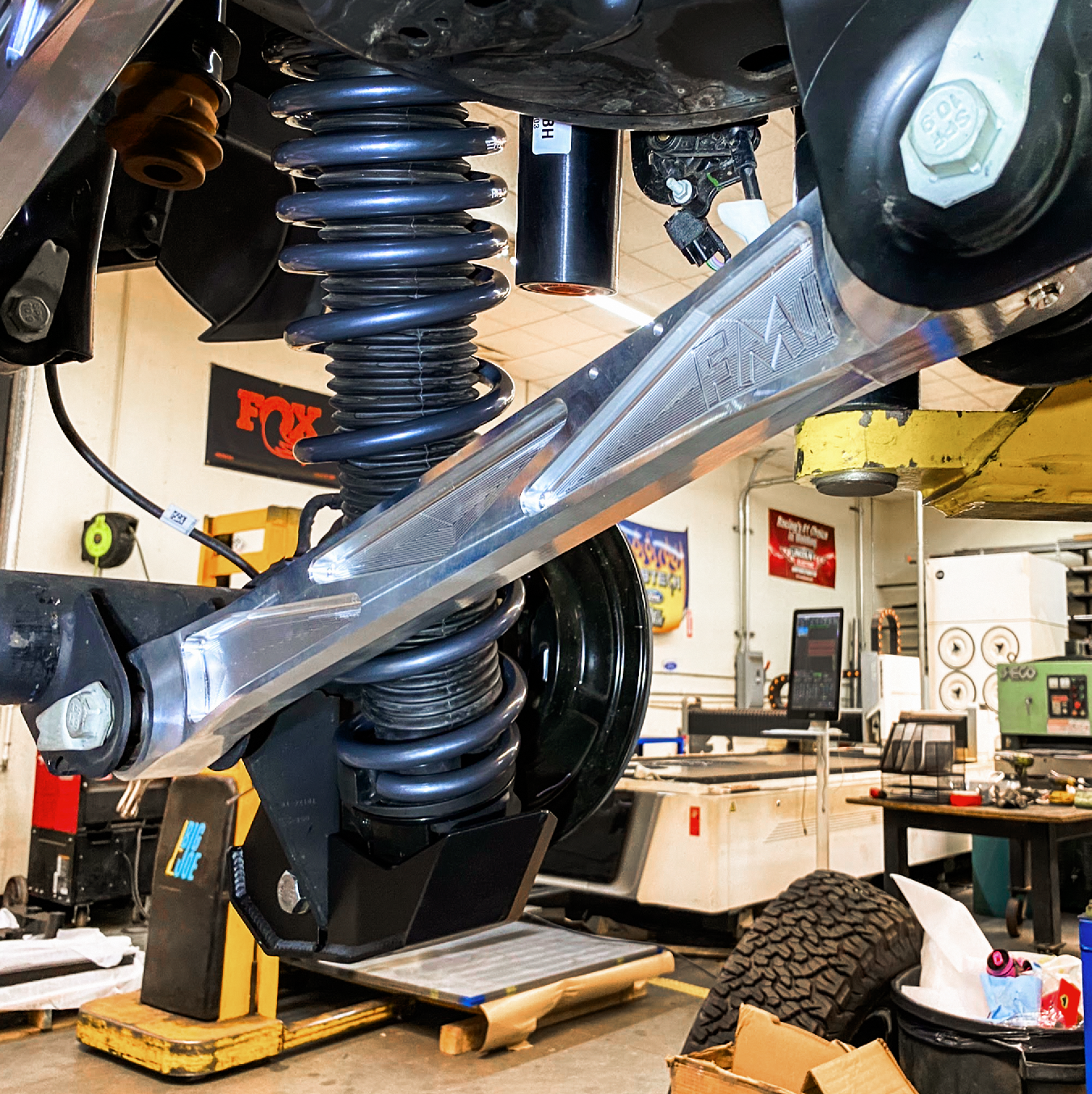 Billet aluminum rear lower suspension arms with ultra-flex joints for 2022 Bronco Raptor, showcasing durable design and flexibility.