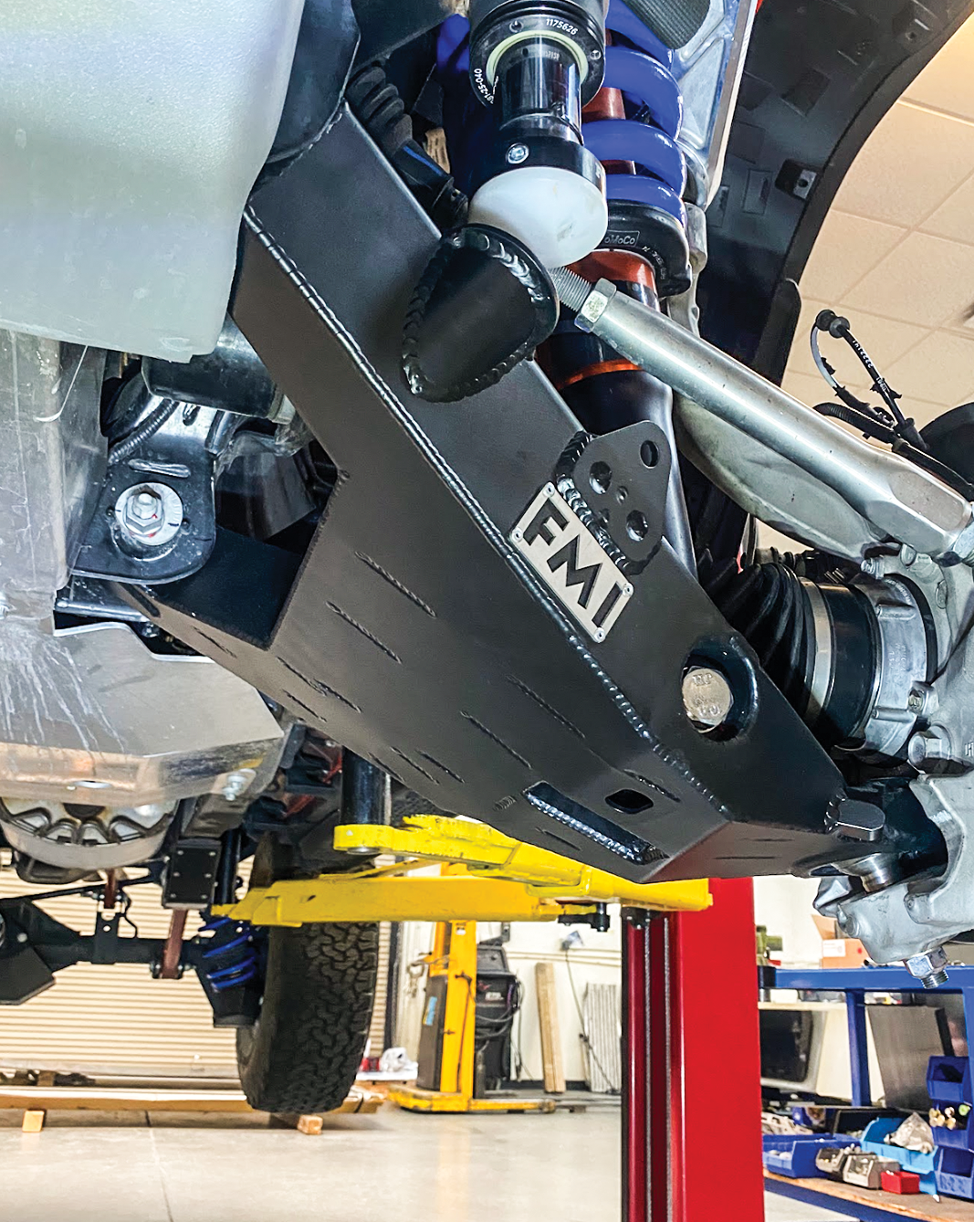 Fabricated lower control arms for 2022+ Bronco Raptor, designed for stock width, showcasing durable construction and suspension components.