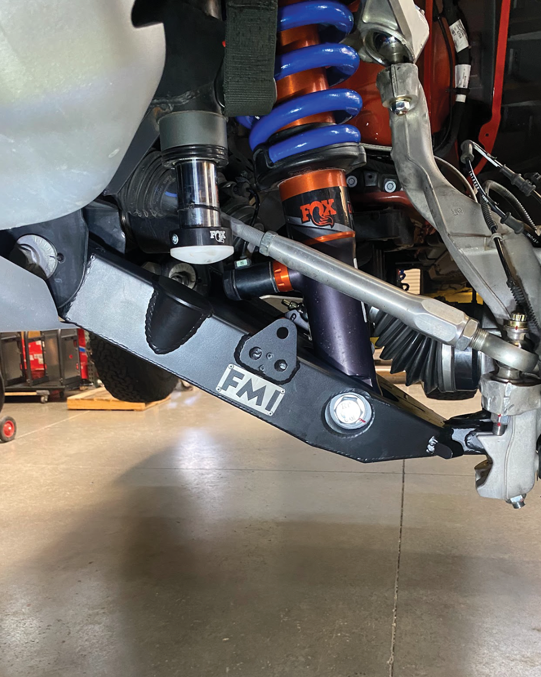 Fabricated lower control arms for 2022+ Bronco Raptor, showcasing stock width and advanced suspension components.