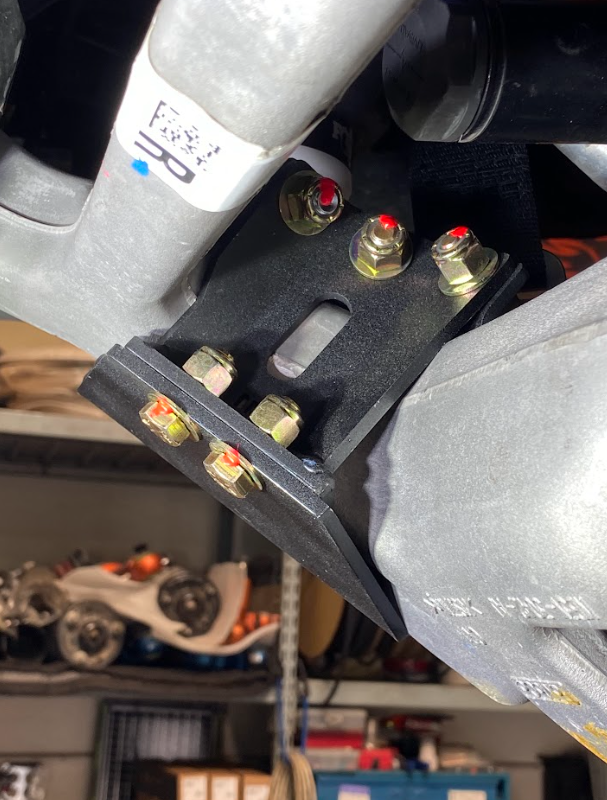 Front limit strap and bump stop for 2022+ Bronco Raptor, designed for stock lower arm installation.
