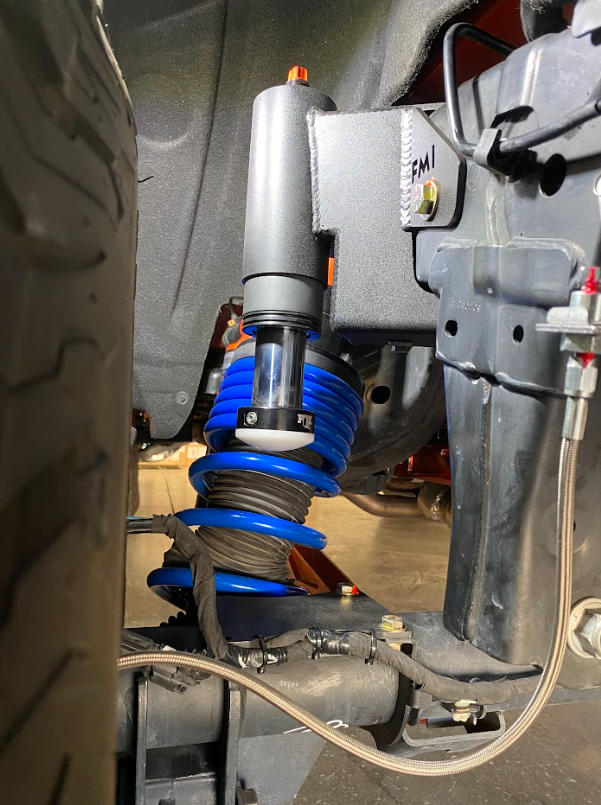 Rear hydraulic bump stop kit for 2022+ Bronco Raptor, featuring blue springs and durable mounting components.