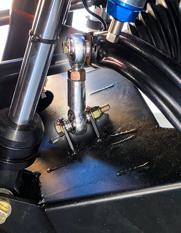 2022 Bronco Raptor sway bar link kit installed on a fabricated lower arm, showcasing durable metal construction and fittings.