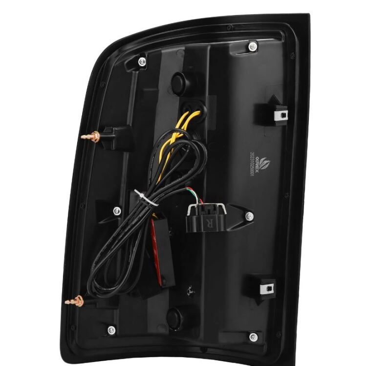 AlphaRex Luxx Series LED tail lights for 07-13 GMC Sierra models, featuring a sleek alpha black design and wiring connections.