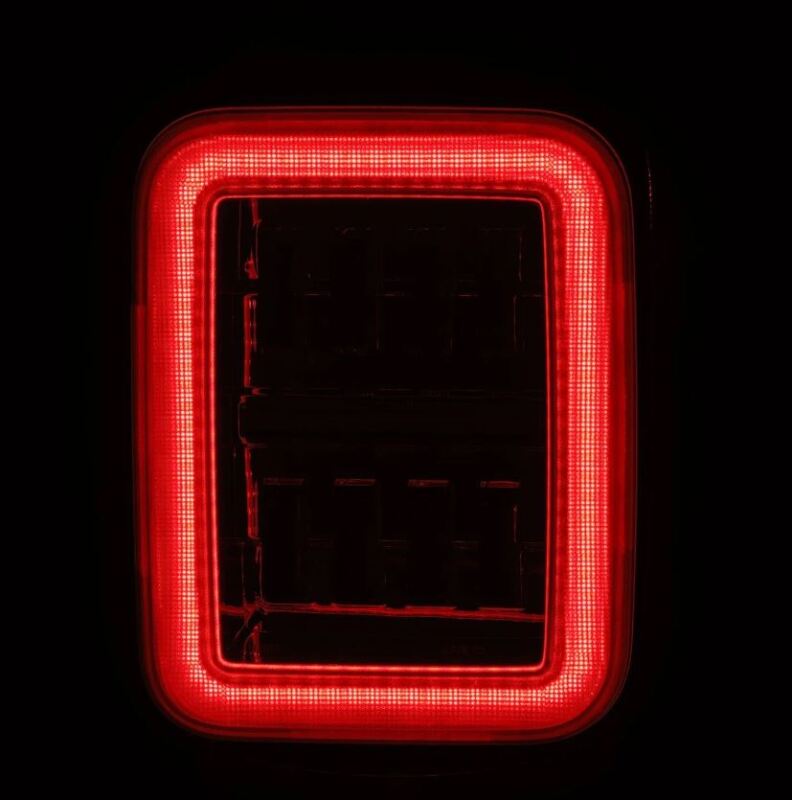 AlphaRex prismatic LED tail lights for 19-24 Jeep Gladiator JT in chrome finish, featuring a bright red illumination.