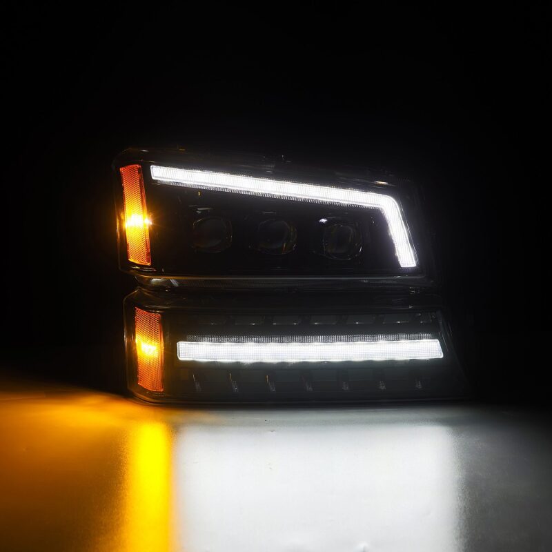 AlphaRex NOVA LED projector headlights for 03-06 Chevy Silverado and Avalanche, featuring sleek black design and bright illumination.