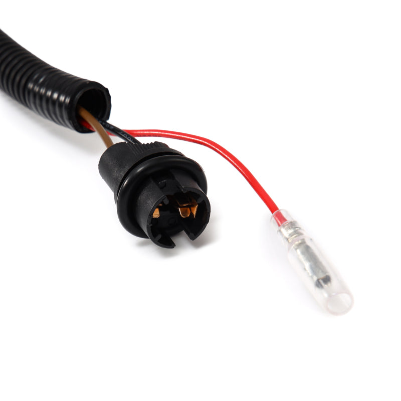 Wiring adapter for 2019-2023 Chevrolet 1500, connecting stock LED taillights to AlphaRex taillights.