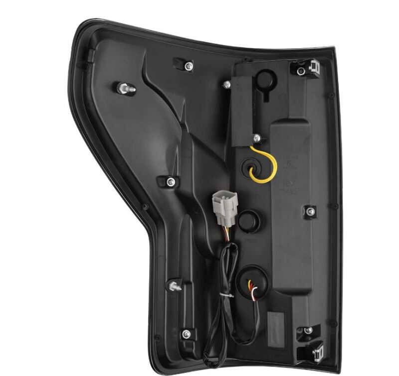 AlphaRex 07-13 Toyota Tundra Nova-Series LED tail lights in alpha-black, showcasing the back housing and wiring connections.