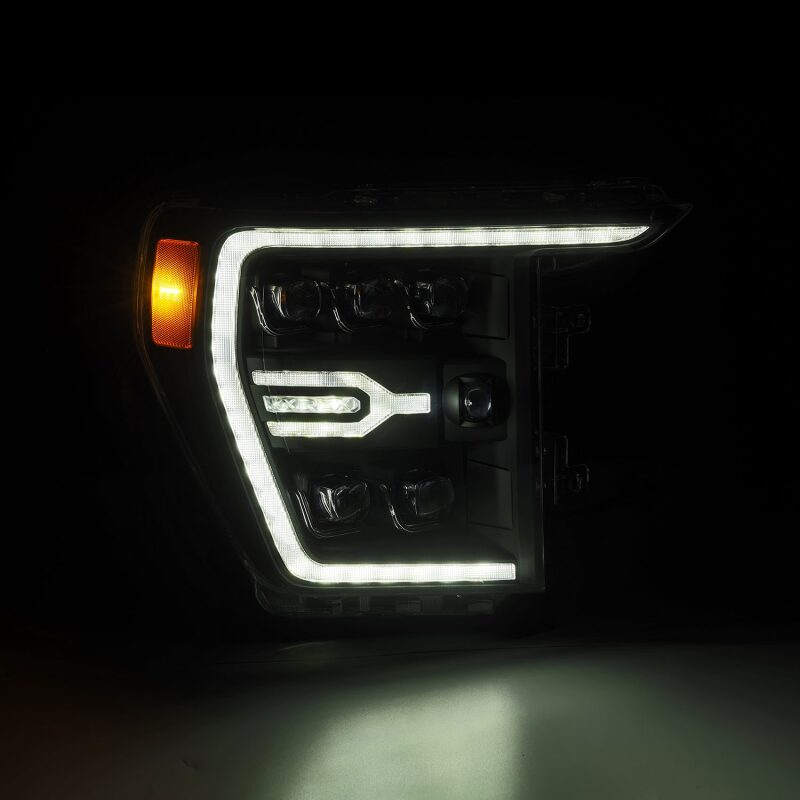 AlphaRex NOVA LED projector headlights for 21-22 Ford F-150, featuring plank style design, black housing, and sequential signals.