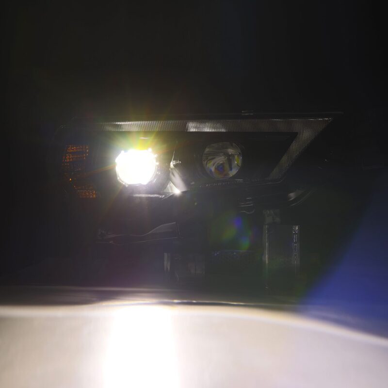 AlphaRex LUXX-Series LED projector headlights for 14-22 Toyota 4Runner, featuring black housing, active light, and sequential signals.