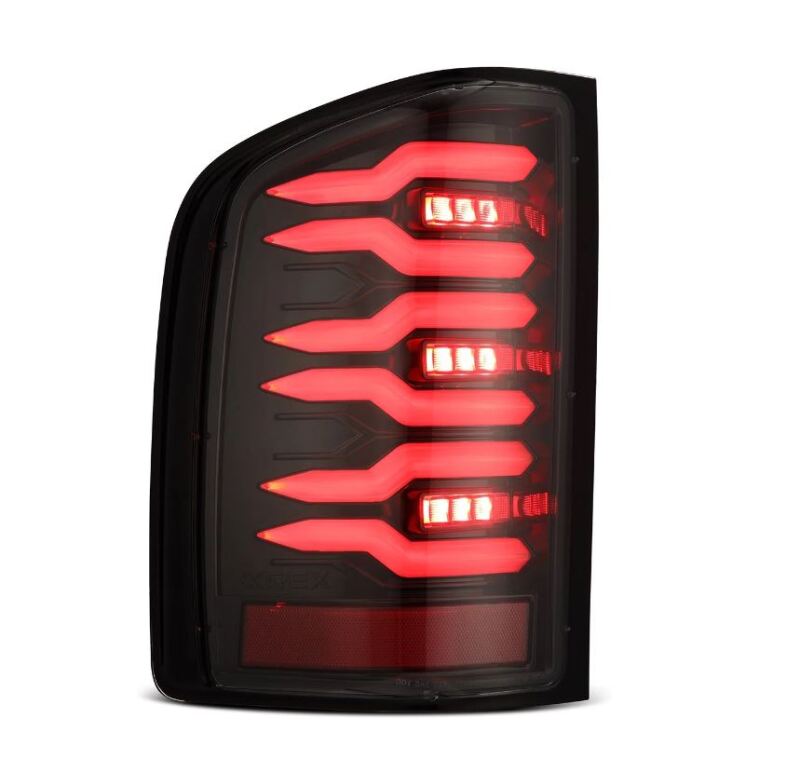 AlphaRex LUXX-Series LED tail light for 2007-2013 Chevrolet Silverado 1500, featuring a sleek black design and bright red LEDs.