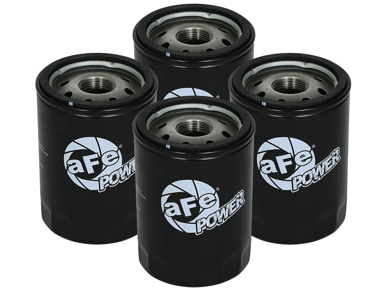Set of four aFe PROGUARD oil filters designed for enhanced engine protection and performance in offroad vehicles.