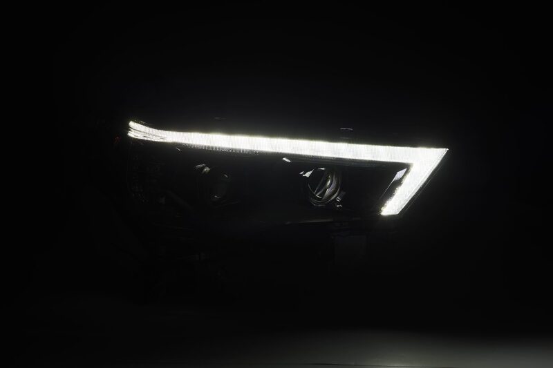 AlphaRex LUXX LED projector headlights for 2014-2020 Toyota 4Runner in black with sequential signals and DRL.