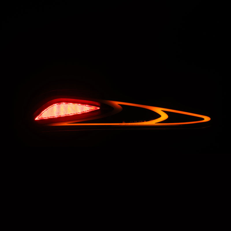 AlphaRex LUXX-Series FT-1 Style LED tail lights for 20-24 Toyota Supra in black, showcasing a sleek and modern design.