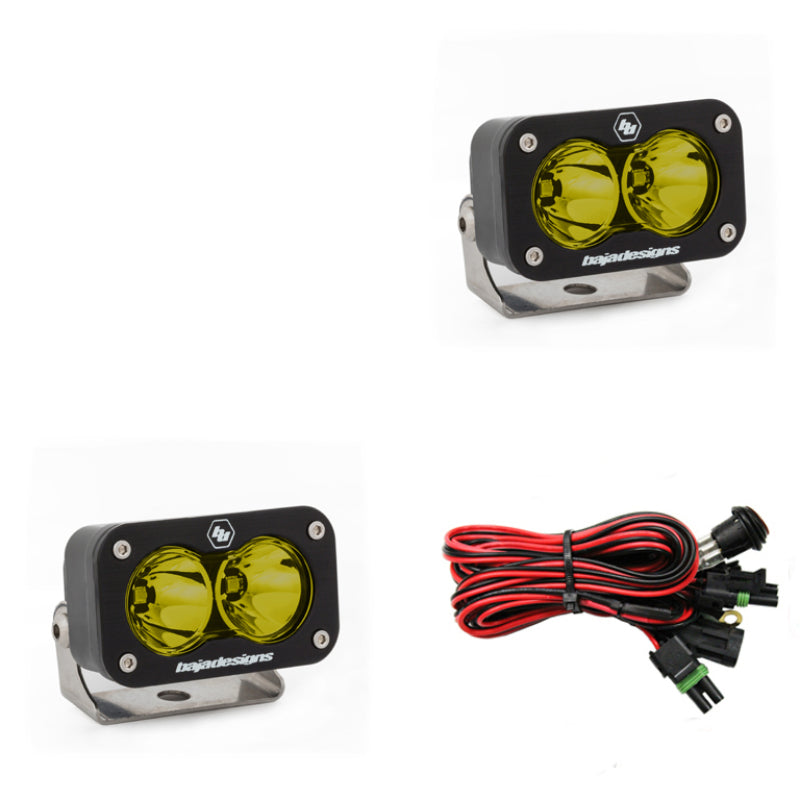 Baja Designs S2 Sport Spot Pattern LED work light in amber with dual lenses and wiring harness for offroad use.