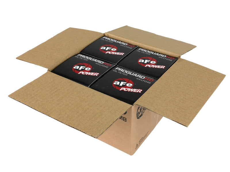 aFe PROGUARD oil filters packaged in a cardboard box, showcasing multiple filters for enhanced engine protection.