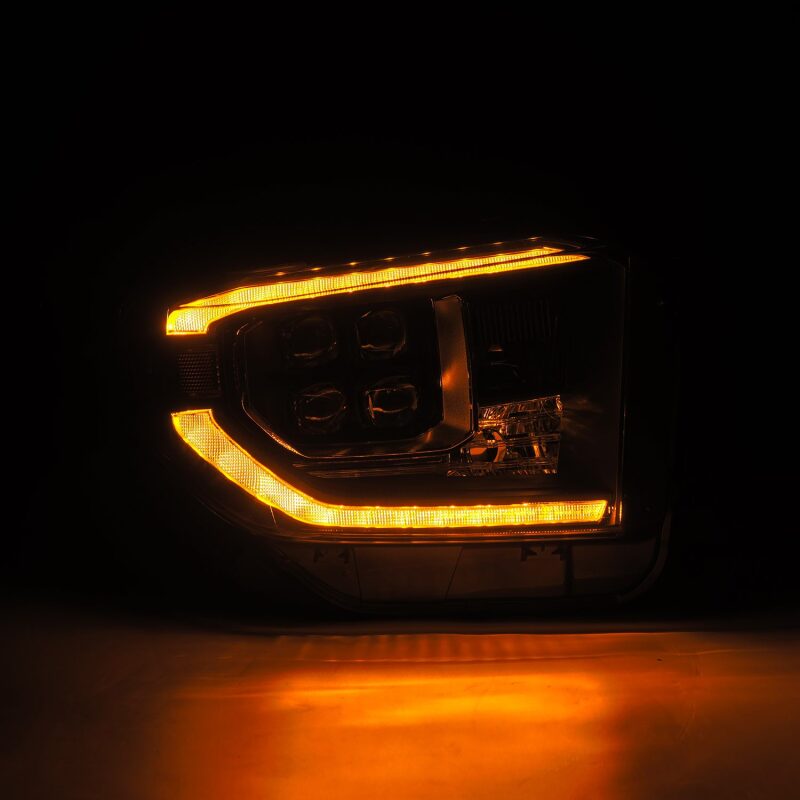 AlphaRex NOVA-Series LED projector headlights for 14-21 Toyota Tundra in black with sequential signals and DRL.
