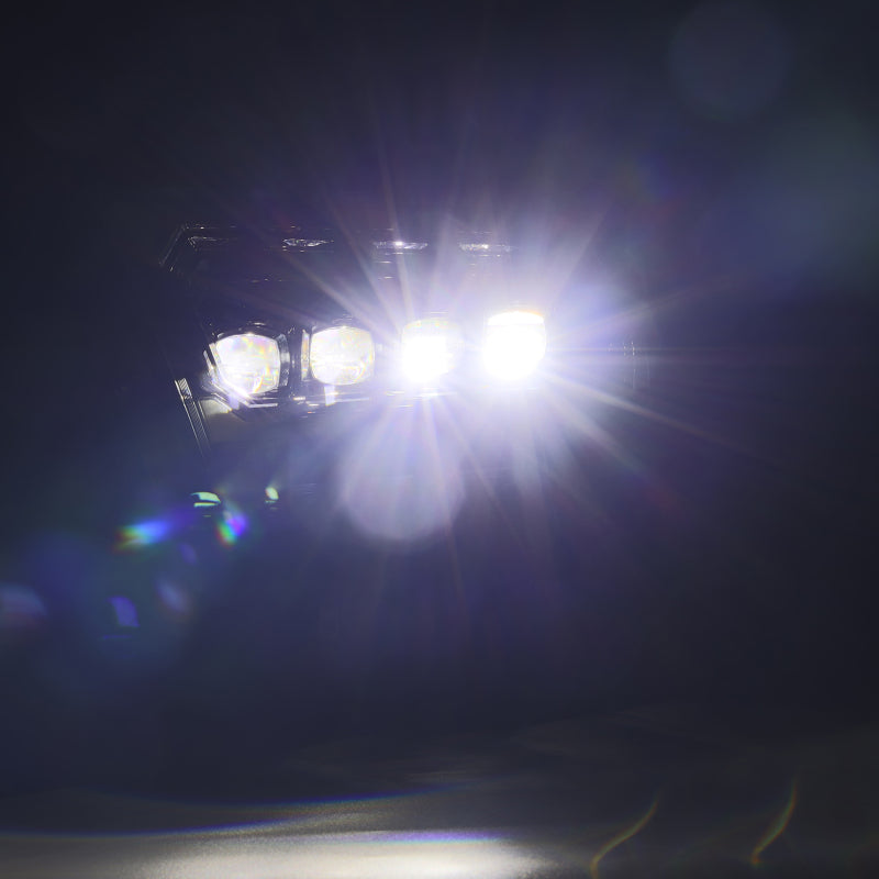 AlphaRex NOVA-Series LED projector headlights for 2019-2023 Dodge Ram 1500, featuring a sleek black design and bright illumination.