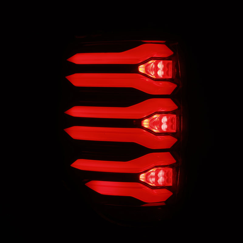 AlphaRex LUXX LED taillights for 09-14 Ford F150 featuring a sleek black and red housing design.