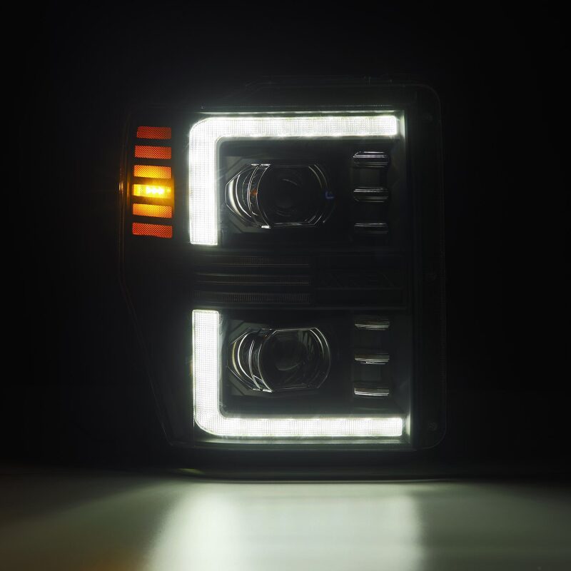 AlphaRex PRO-Series projector headlights for 08-10 Ford F250-550, featuring black housing, sequential signals, and active lighting.