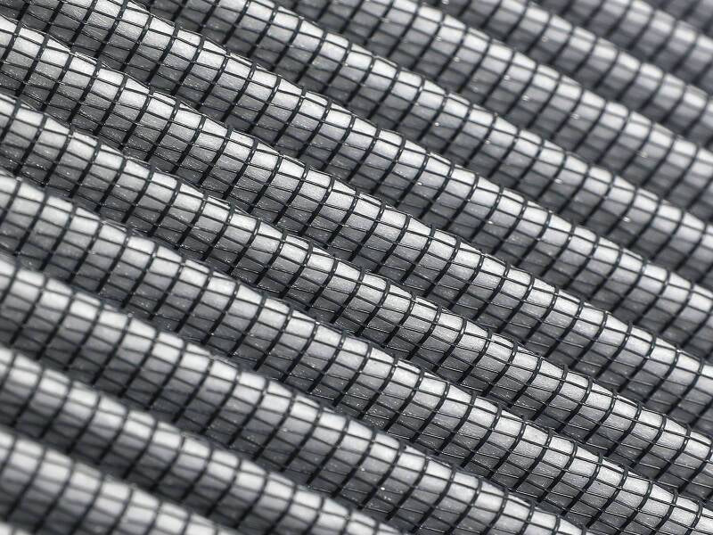 Close-up of the aFe Track Series intake replacement air filter showcasing its pleated design and durable construction.