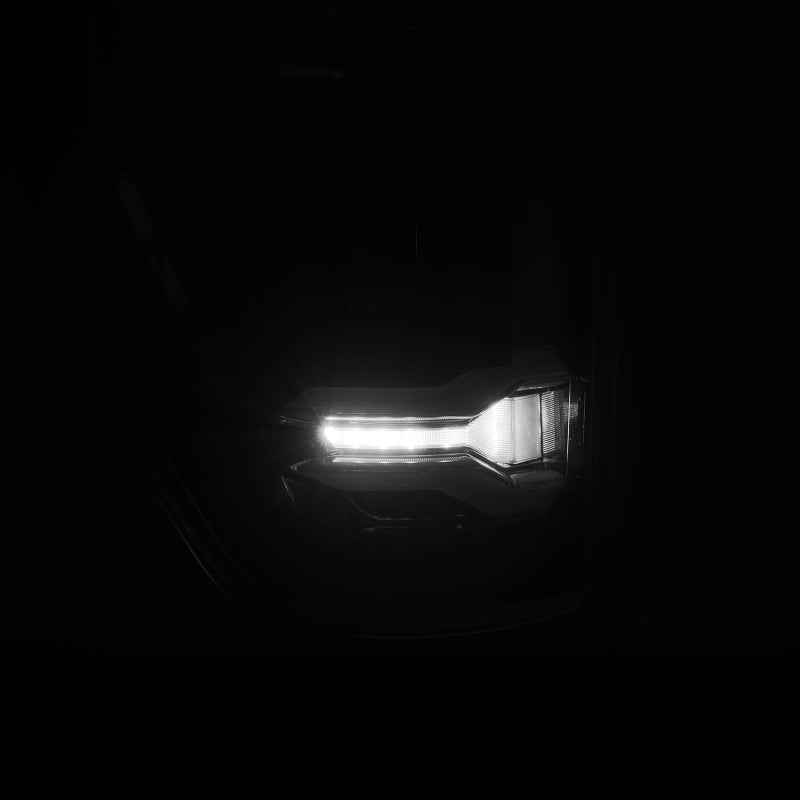 AlphaRex LUXX LED taillights for 21-23 Ford F-150 in black with BLIS feature, showcasing a sleek, modern design.