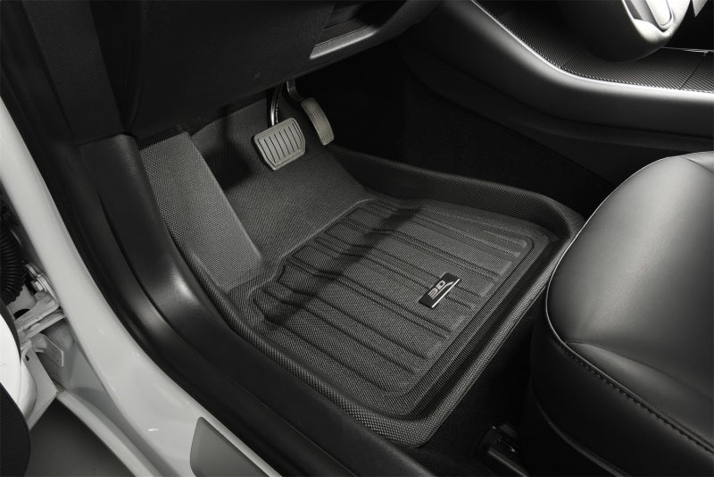 3D MAXpider black floormats for 2026 Tesla Model Y, designed for 1st and 2nd row, showcasing a textured surface for durability.