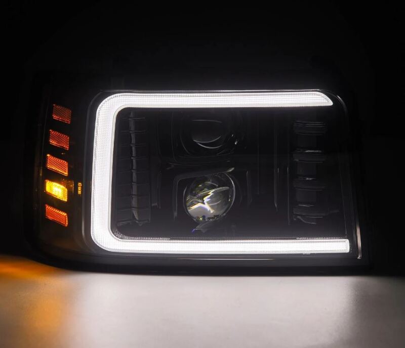 AlphaRex PRO-Series projector headlights for 92-96 Ford F-Series/Bronco in black with sequential signals and DRL.