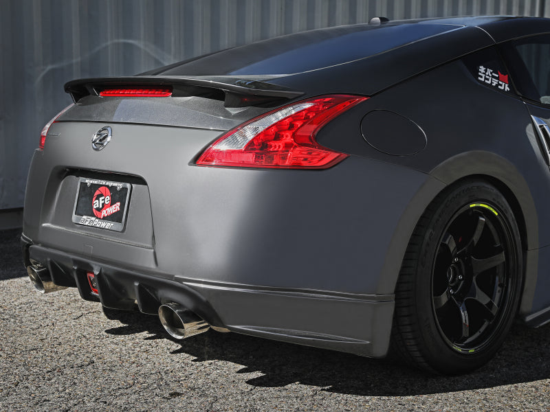 Afe Takeda Cat-Back Exhaust System installed on a Nissan 370Z, showcasing sleek design and dual exhaust tips.