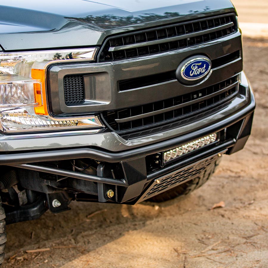 2018-2020 F-150 Baja bolt-on bumper featuring a rugged design and integrated LED light bar for enhanced offroad capability.