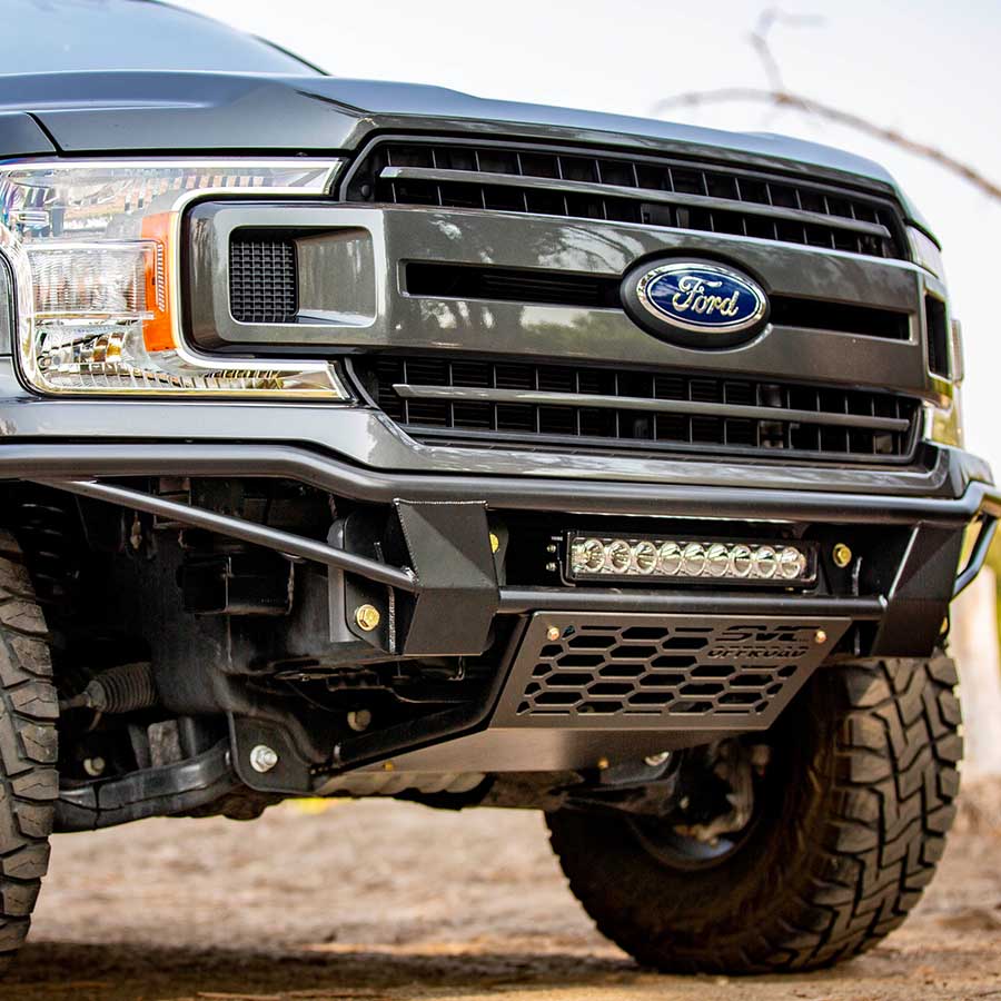 2018-2020 F-150 Baja bolt-on bumper showcasing rugged design and integrated LED light bar for offroad performance.